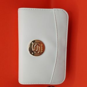 New Bebe brand purse in white with gold chain